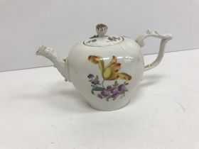 An 18th Century Meissen miniature teapot with floral spray decoration,