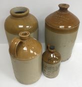 A collection of stoneware flagons, one inscribed "Horrocks & Sons 1919",
