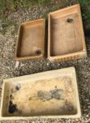 A collection of three various terracotta Belfast sinks