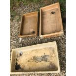 A collection of three various terracotta Belfast sinks