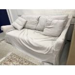 A Santa Fe three seat sofa, natural linen with loose covers (ex Sofa Workshop,