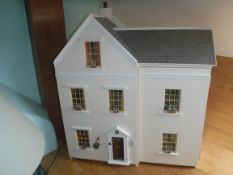 A modern dolls' house "Holly Lodge" as a Georgian townhouse,