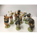 A Beswick Pig Band of nine pieces including "Michael" (PP6), "Andrew" (PP4), "Daniel" (PP5),