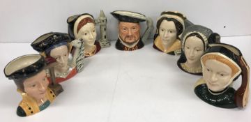 A set of Royal Doulton character jugs comprising Henry VIII (D6642) and his six wives including