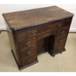 A 19th Century mahogany kneehole desk,