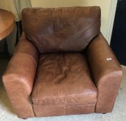 A "The Vintage Tanning Company" (Halo) brown leather upholstered armchair 97 cm wide x 87 cm deep x