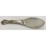 An Eastern (probably Burmese) sterling silver rice spoon, 2.