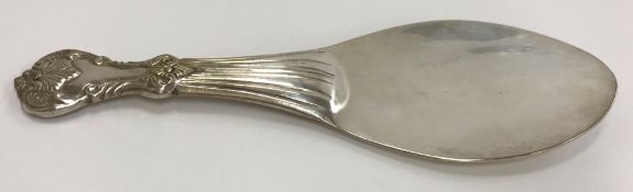 An Eastern (probably Burmese) sterling silver rice spoon, 2.