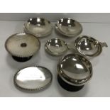 A collection of silver trophies, quaich, candlestick,