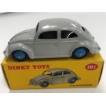 A Dinky Toys Volkswagen Beetle (181) in grey paintwork with blue hubs (boxed)