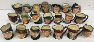 A collection of mid sized Royal Doulton character jugs comprising Toby Philpot,