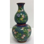 A Chinese cloisonné double gourd shaped vase with lattice and floral decoration,