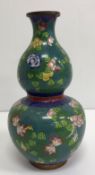 A Chinese cloisonné double gourd shaped vase with lattice and floral decoration,