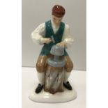 A Royal Doulton figure "The Silversmith of Williamsberg" (HN72208), circa 1959, 16 cm high,