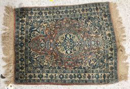 A vintage Kashan rug,