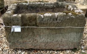 A natural stone rectangular trough height36cm width 72cm depth 53cm.