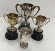 A collection of silver and silver plated trophies,