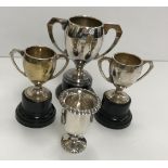 A collection of silver and silver plated trophies,