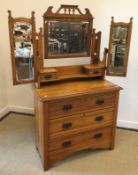Two Victorian satin walnut dressing chests with mirrored super structures over three drawers 84 cm