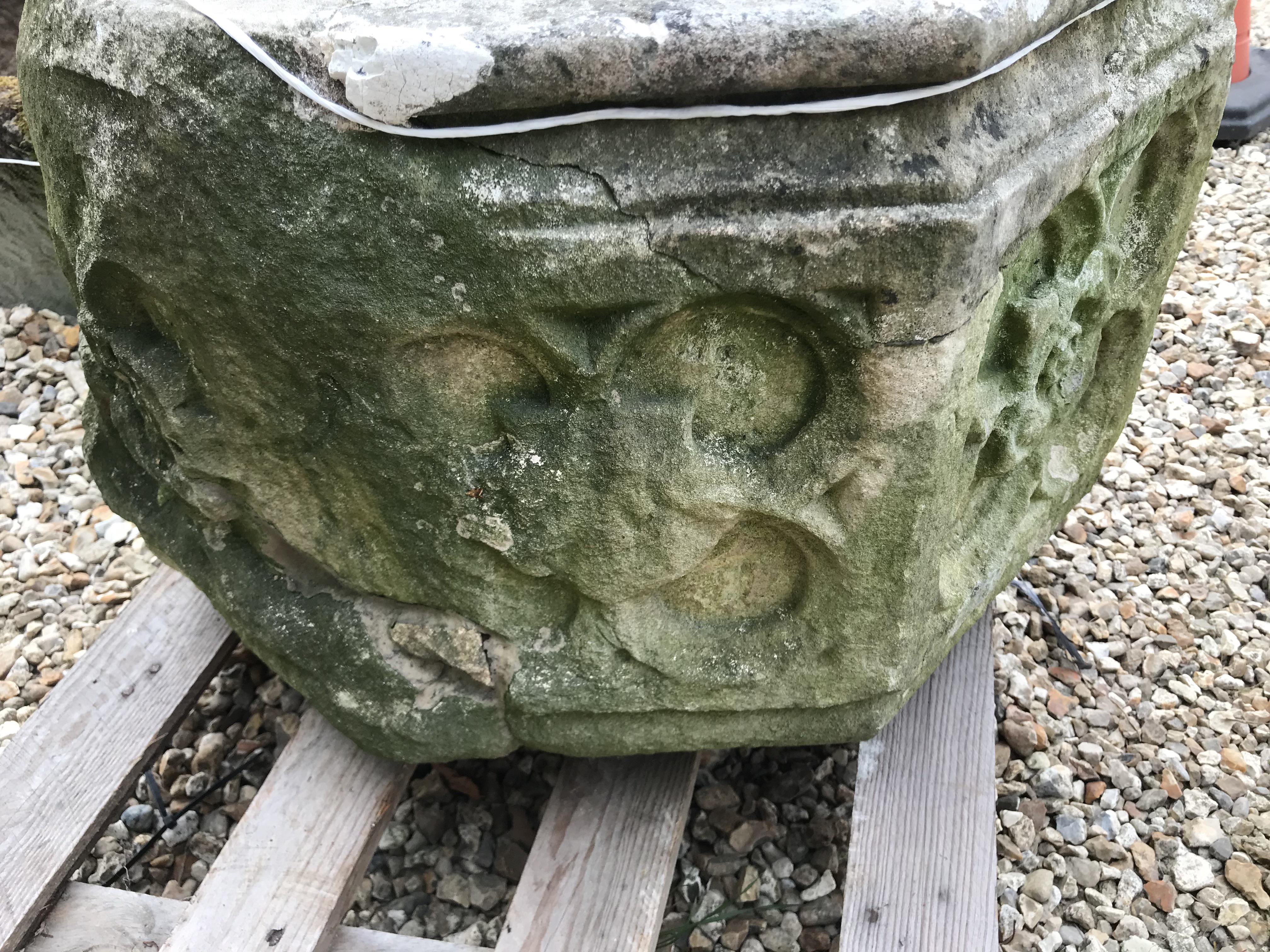 A natural stone font of octagonal form with rose decoration to each side height 45cm width 63cm - Image 7 of 10