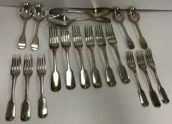 A collection of "Old English" pattern silver cutlery comprising a pair of Georgian tablespoons (by
