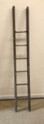A 19th Century oak folding library ladder,