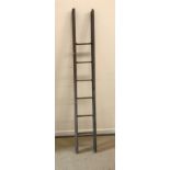 A 19th Century oak folding library ladder,