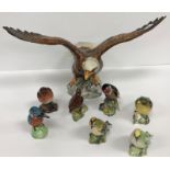 A Beswick figure of "Bald Eagle", No'd, 1018 to base, together with a Beswick "Robin", No'd.