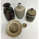 A collection of pottery to include a Danny Killick pottery lidded storage jar of square tapering