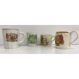 Two boxes containing assorted commemorative mugs, beakers,