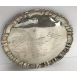 A sterling silver un-marked silver tray / salver as a trophy, 10.