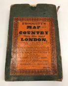 A paper covered canvas map "Froggett's Map of the Country 30 miles round London",