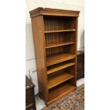 A 20th Century oak open bookcase in the 18th Century style,