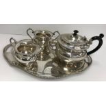 A sterling silver three-piece tea set comprising teapot, 27.15 oz, sugar basin, 3.