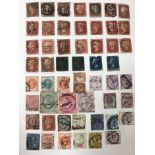 Four albums of various British and World stamps including 23 Penny Reds,