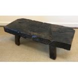 An 18th or early 19th Century Provincial carved treenware cheese makers bench,