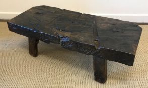 An 18th or early 19th Century Provincial carved treenware cheese makers bench,