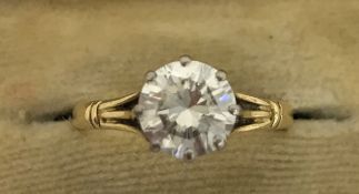 An 18 carat gold diamond set solitaire ring, size M/N, 1.5 carat, approx 3.