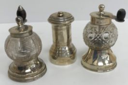 Two silver mounted cut glass pepper grinders, one (by Hukin & Heath, Birmingham 1920),