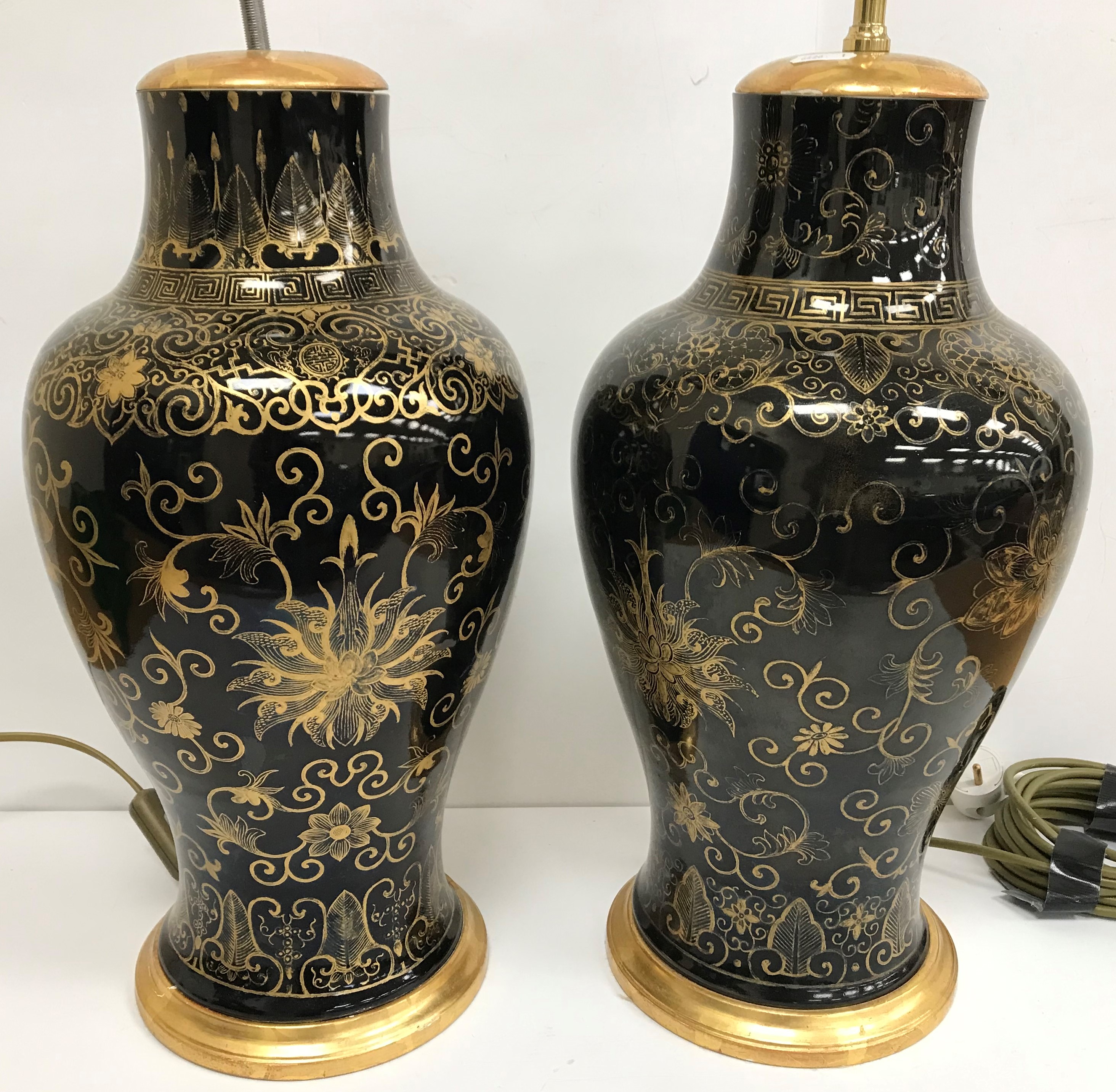 A pair of 19th century Chinese mirror black (Wujin) balaster shaped vases with all over scrolling