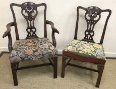 A set of four early 20th Century mahogany Hepplewhite design elbow chairs with tapestry upholstered
