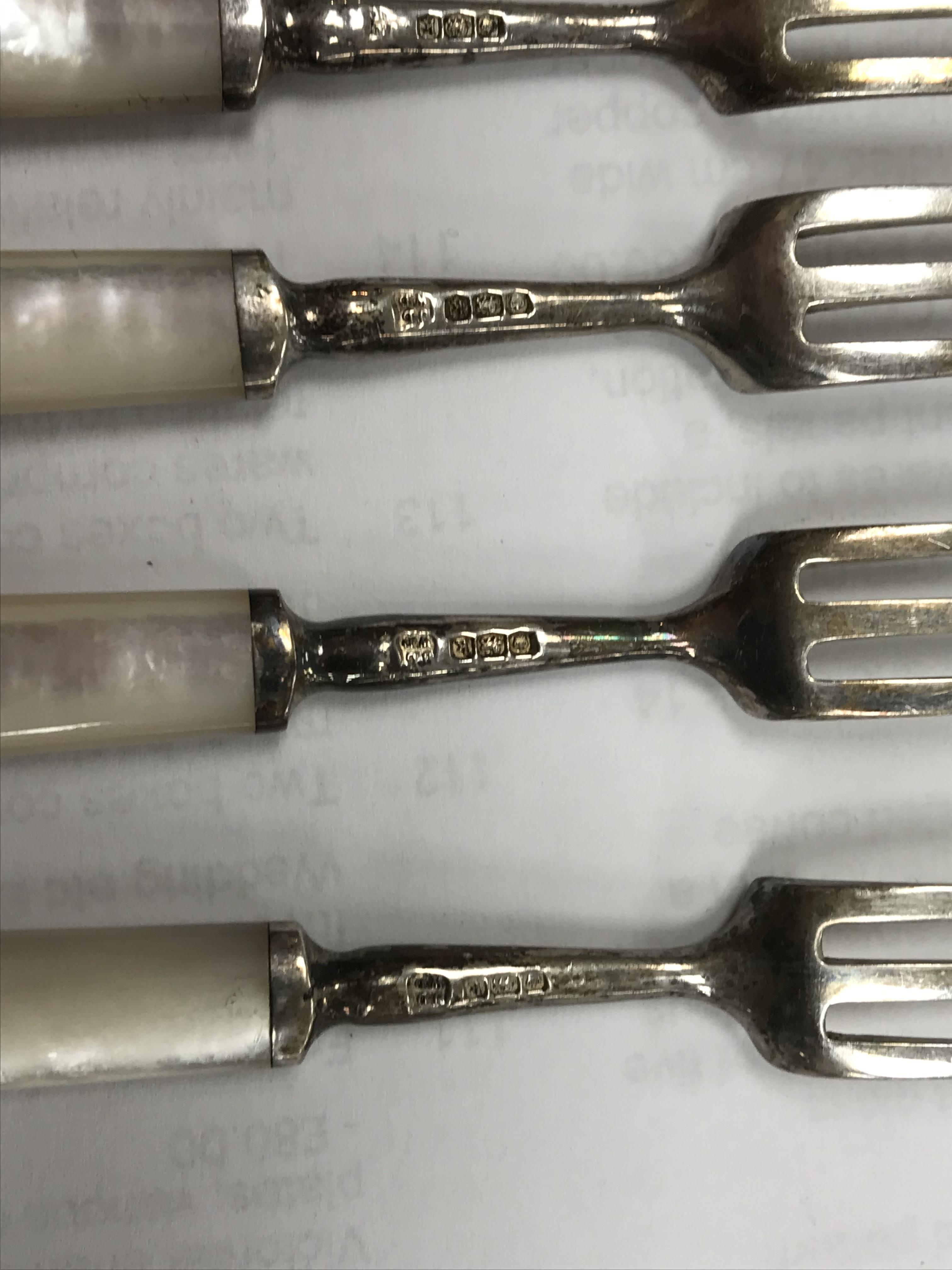 A cased set of six silver bladed and tined mother of pearl handled fruit knives and forks (by James - Image 11 of 26