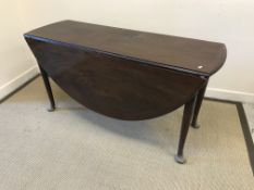 A 19th Century mahogany oval drop-leaf dining table, the top with plain moulded edge,