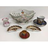 A collection of china to include a Meissen waisted vase of small proportions with puce and gilt