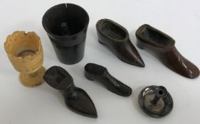 A collection of treen ware to include four model shoes,