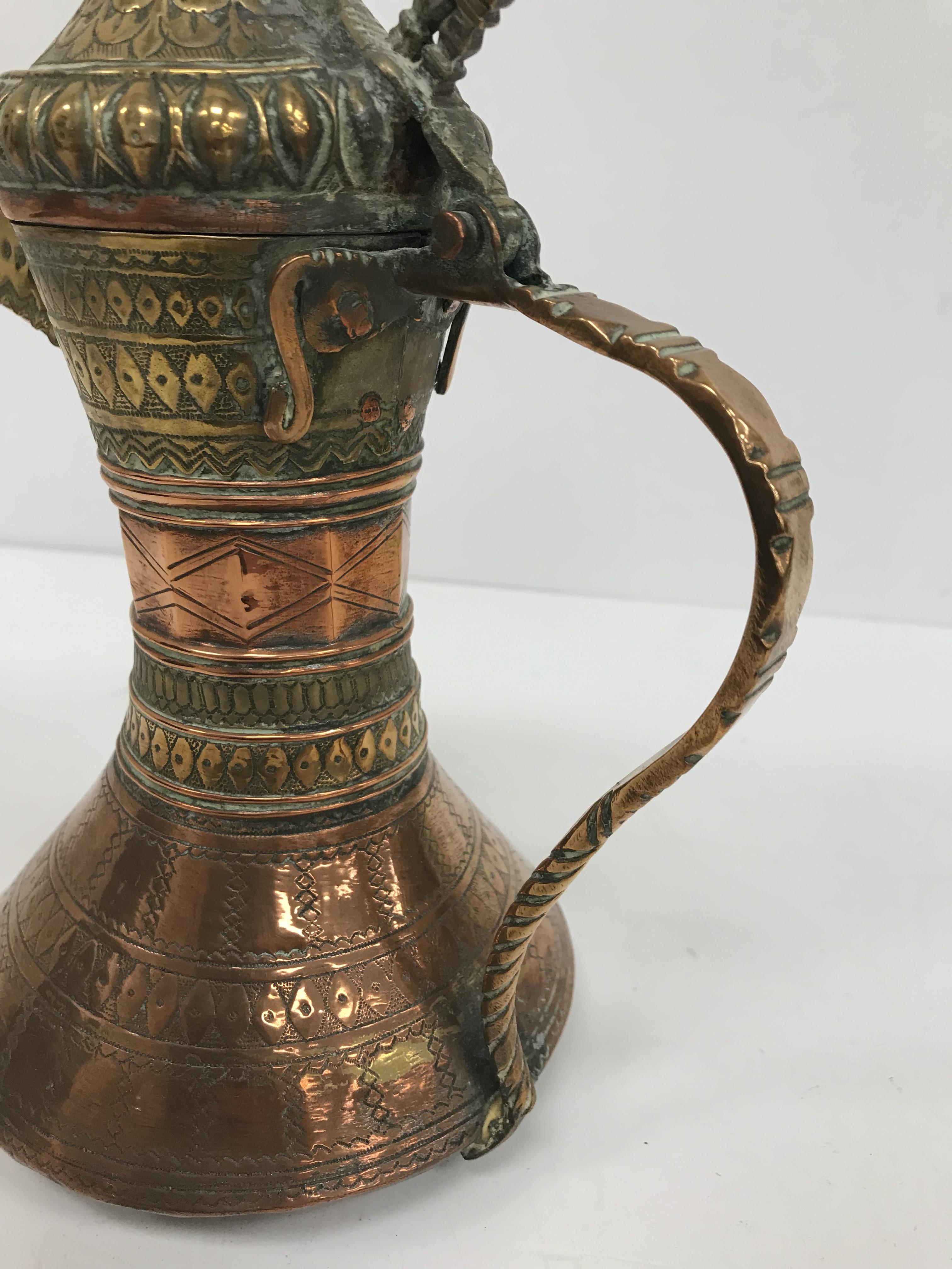 A collection of Middle Eastern and other copper wares to include two Turkish coffee pots, - Image 69 of 115