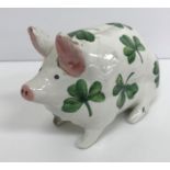 A Wemyss pottery pig with all over green clover decoration,