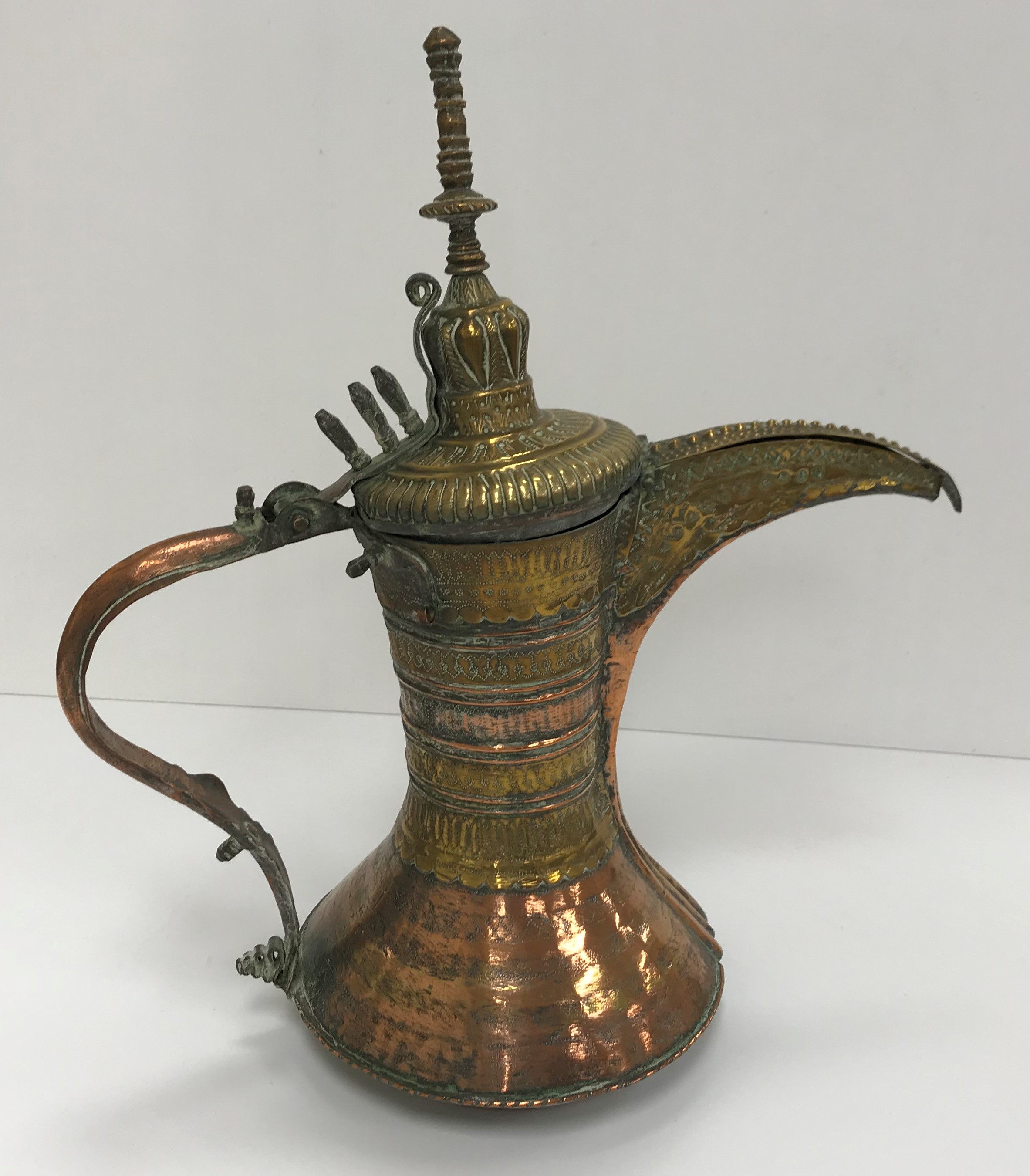 A collection of Middle Eastern and other copper wares to include two Turkish coffee pots,