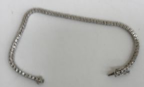 A 9 carat white gold diamond set tennis bracelet, approx 1 carat total, 8.4 g, 17.