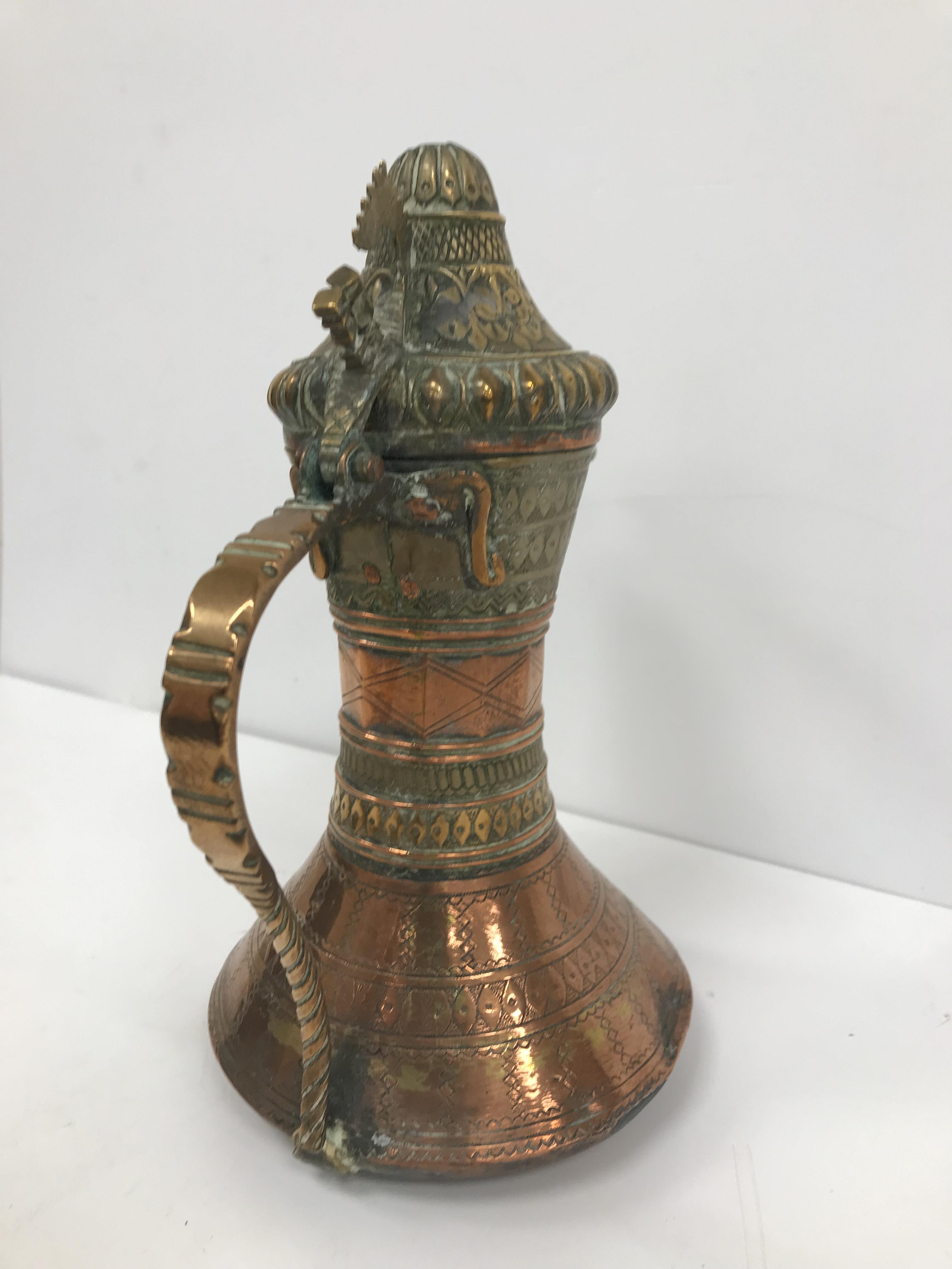 A collection of Middle Eastern and other copper wares to include two Turkish coffee pots, - Image 72 of 115